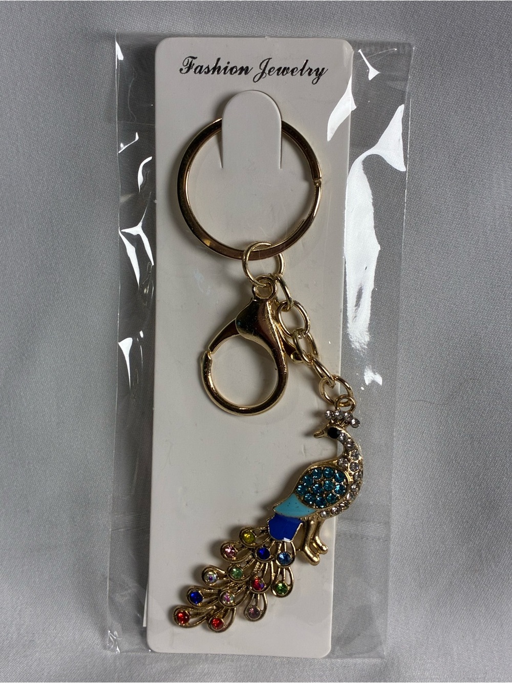 Gold Peacock Key & Card Holder Charm with Blue Enamel and Multicolor Stones